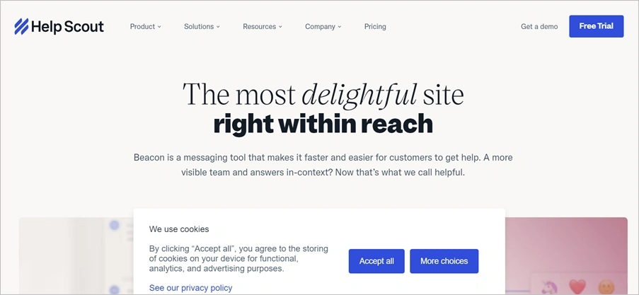 Help Scout webpage with logo, navigation, header “The most delightful site right within reach,” and cookie consent popup