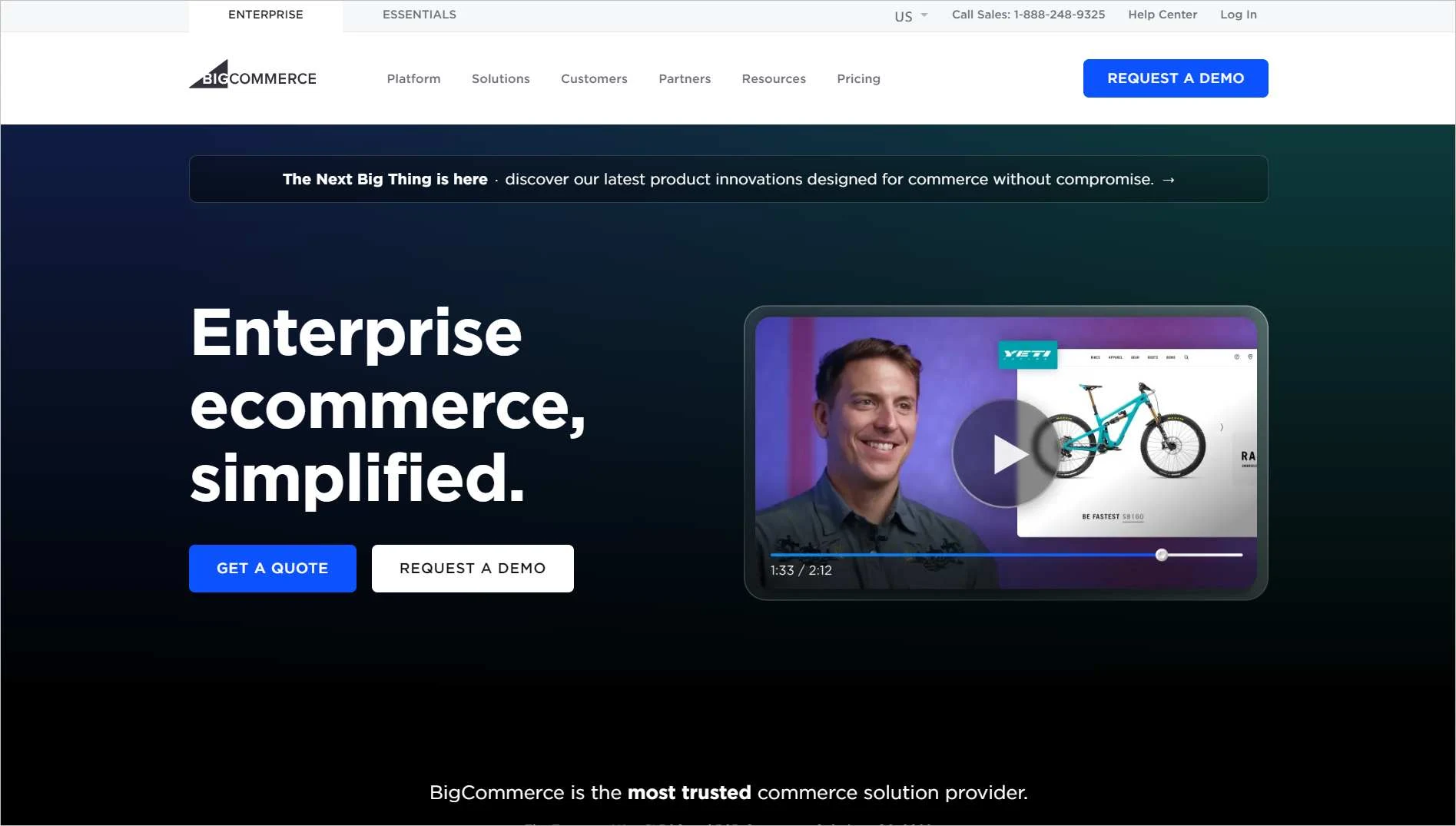 BigCommerce homepage presenting enterprise ecommerce tools with video preview, bicycle imagery, and calls to request a demo