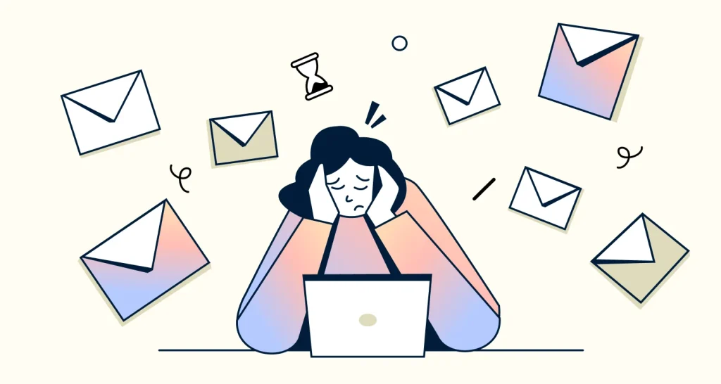 Stressed support agent at a laptop with floating emails, illustrating high-volume email management challenge